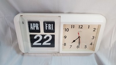 Acctim 93/706 Vintage Wand Klappuhr mit Monat Tag Datum und Uhrzeit