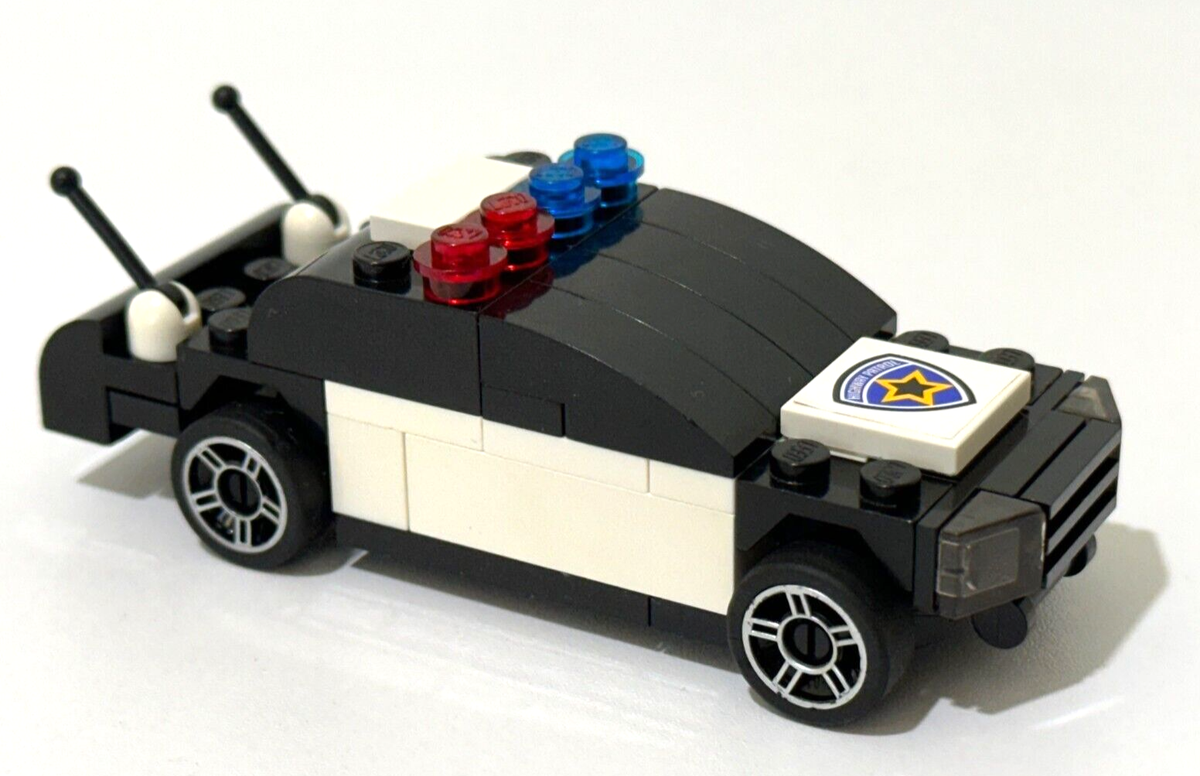 Retired ©2006 LEGO 8665 Racers Tiny Turbos Highway Enforcer