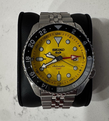 Seiko 5 Sports Automatic GMT Date Yellow Dial Black 24-Hr Bezel Steel 42.5mm