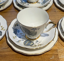 Rare Vintage Queen Anne Bone China Cup, saucer and plate. Green leaf blue flower