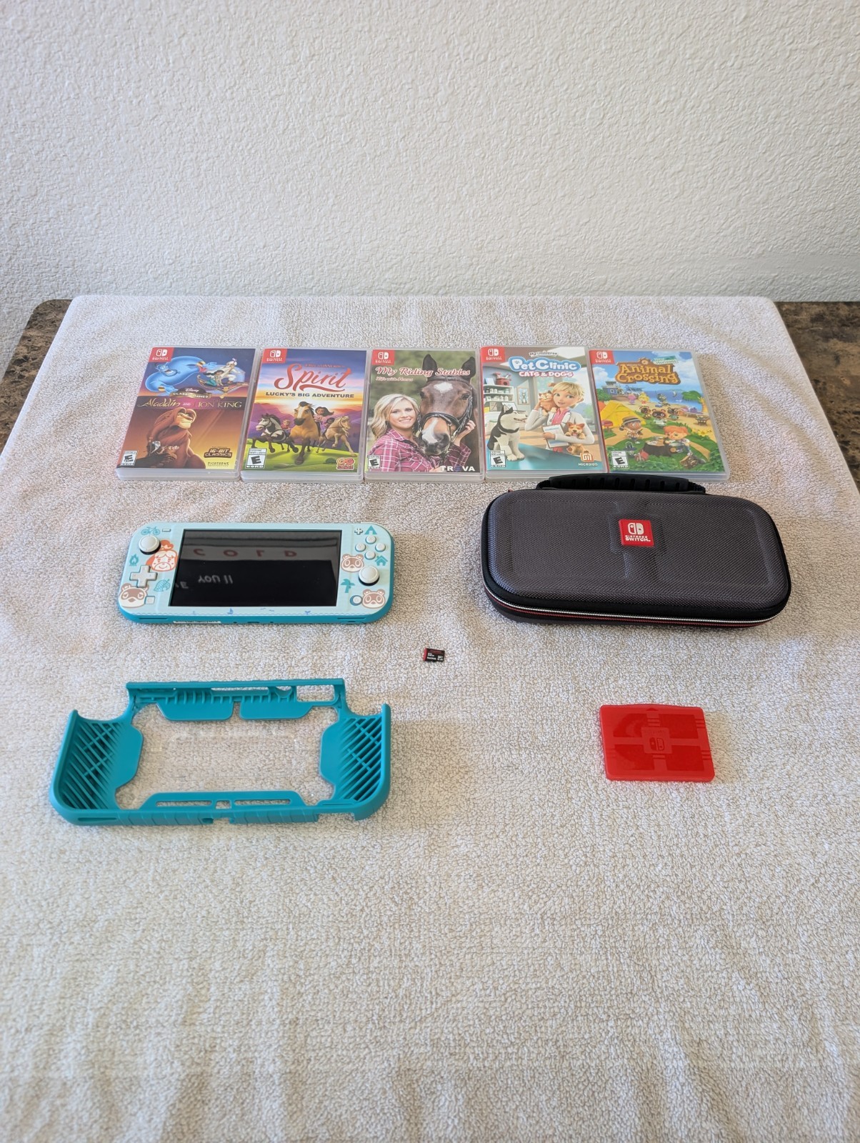 Nintendo Switch Lite Bundle W/ Cases, Games, SD Card, Animal Crossing Skin