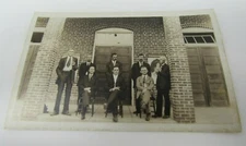 Group of Men Postcard RPPC Real Photo Brick Building 1918-1930