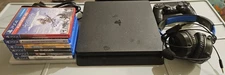 PS4 (Playstation 4) Slim Console and 7 Games Bundle with Controller and Headset