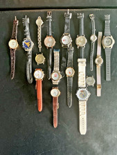 16 quartz advertising or theme watches. All running.