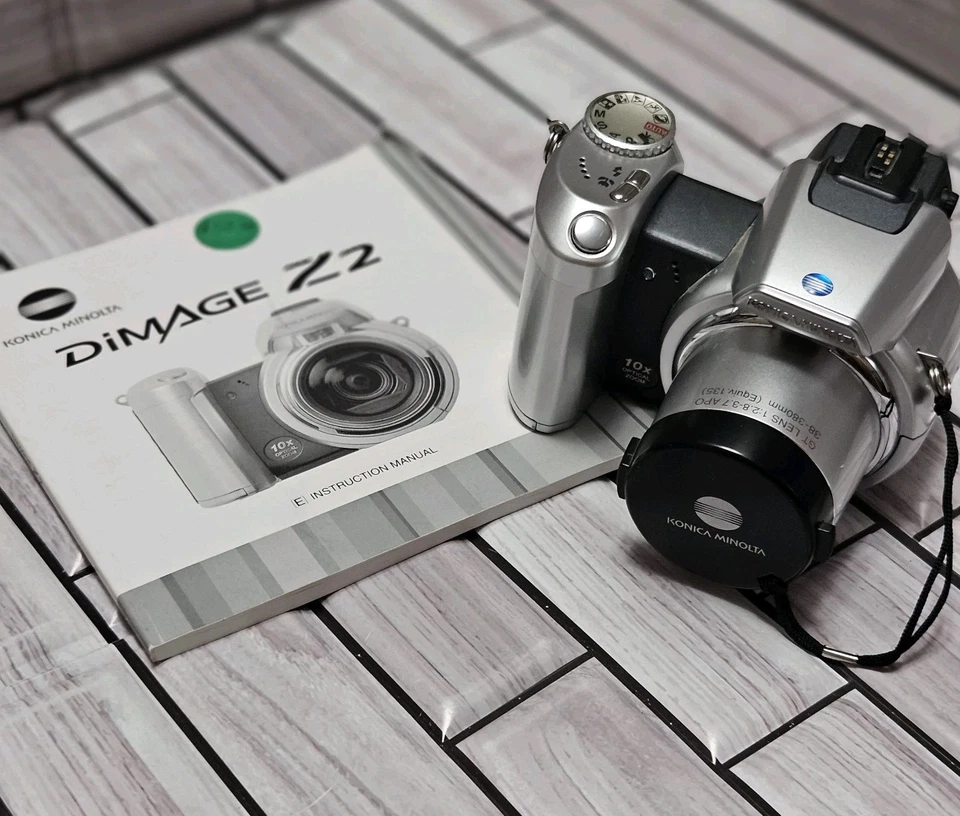 Cámara digital Konica Minolta Dimage Z2 4 MP 10X zoom + libro para piezas o reparaciones Foto 2 de 4