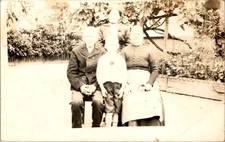 Family Portrait RPPC Postcard 1910s Garden Boy Sweater Badge Apron Domestic
