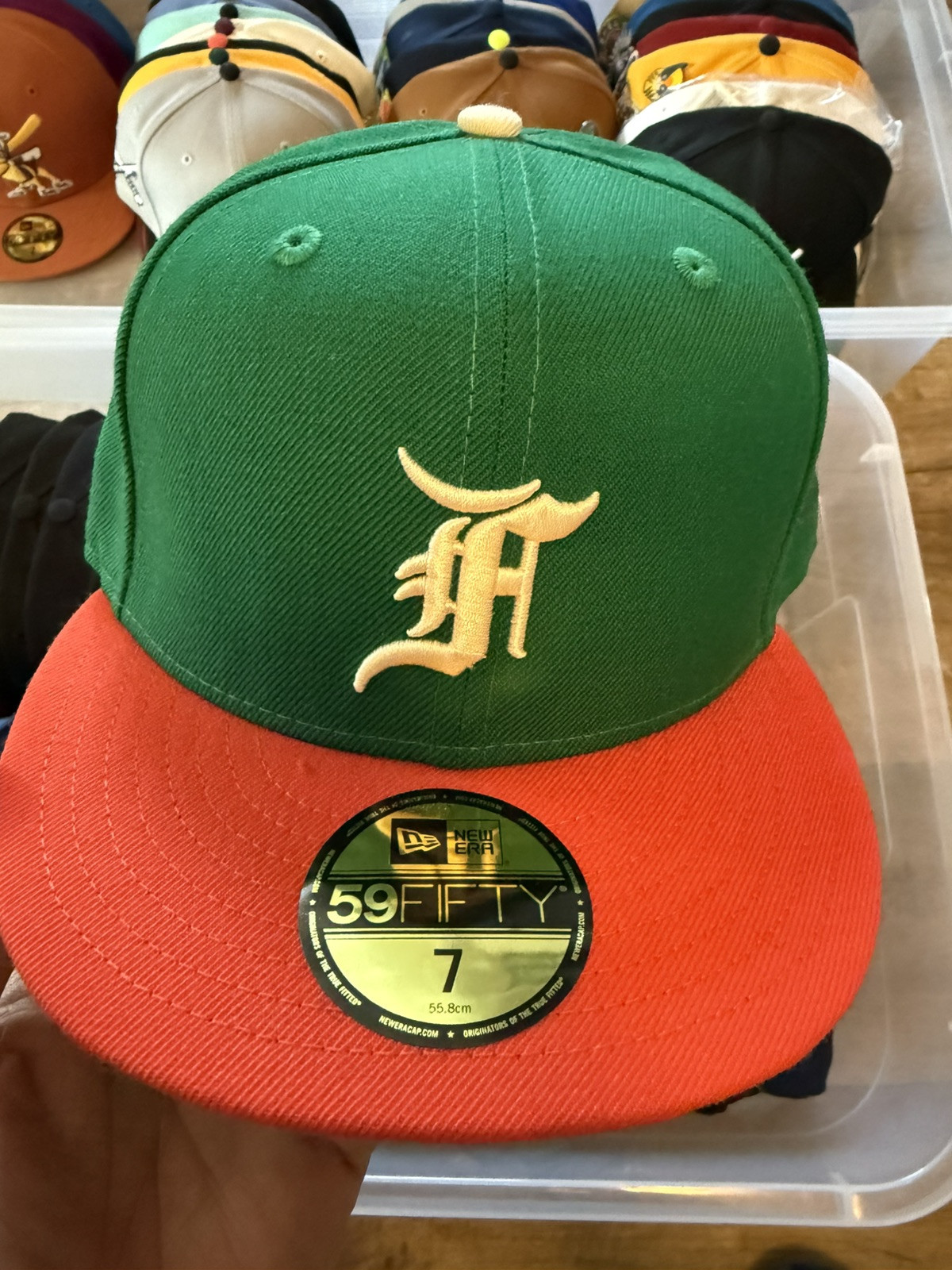 MLB New Era Fear of God Essentials 59FIFTY Fitted Hat green/orange Size 7 NEW