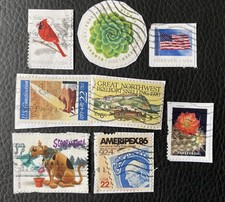 Lot de 8 timbres des USA années diverses - encore sur fragment - Z35