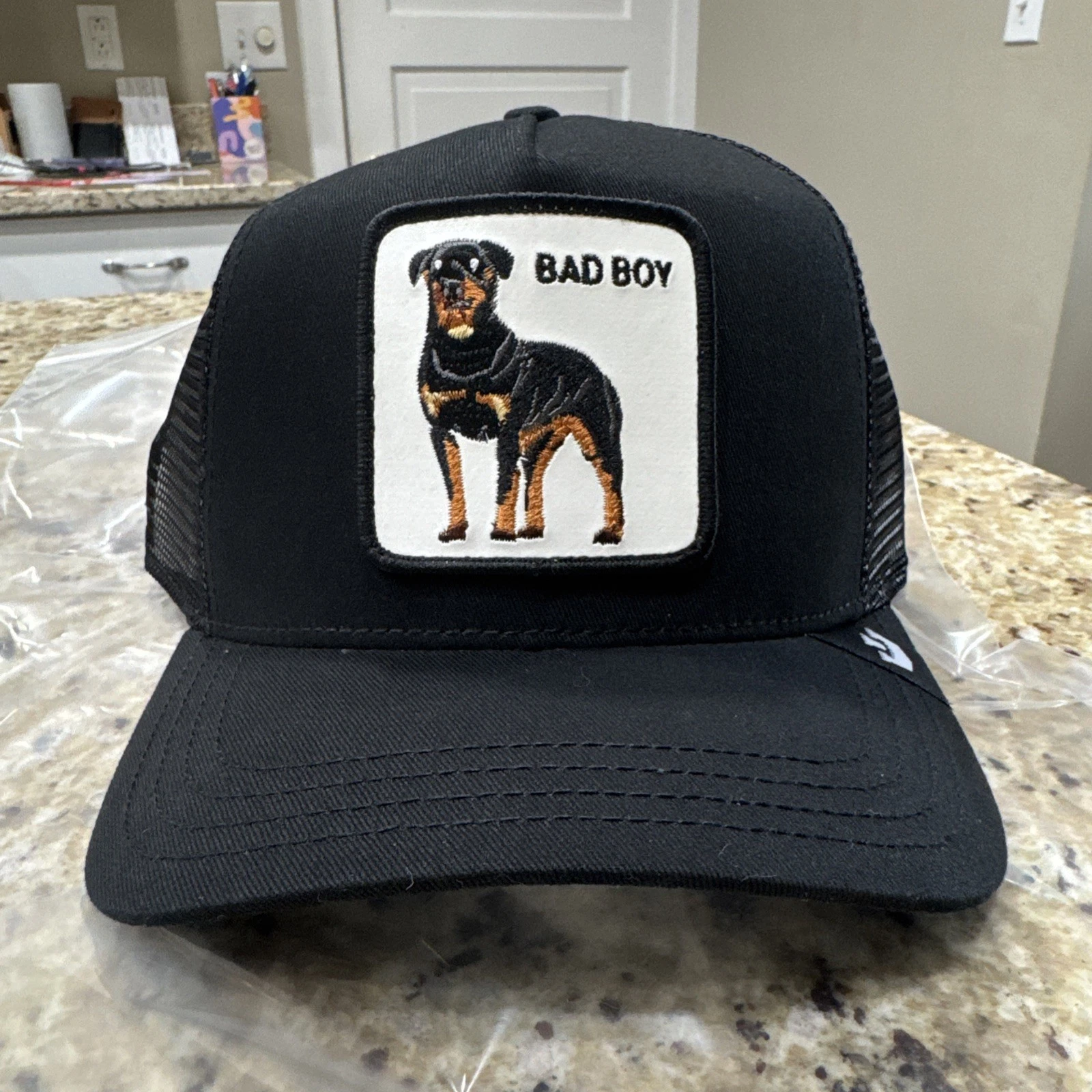 Goorin Bros men's trucker hat. Dog patch. Black. Adjustable mesh back. Bad Boy!