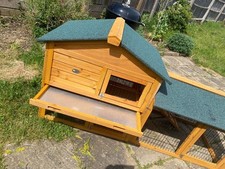 Used outdoor rabbit or guinea pig hutch with run in good condition.