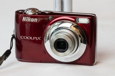 Nikon Coolpix L22 Camera, Red, Battery Cover Damage; For Parts (starts up)