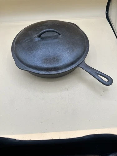 Vtg BSR Red Mountain 10-5/8" cast iron skillet with heat ring and dimpled lid.