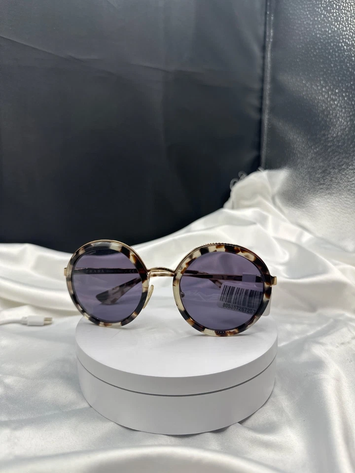 NUEVO CON ETIQUETAS PRADA redondo oro tortuga con lente púrpura. Etiqueta $400.SIN estuche.#DP2881201.Italia. Foto 2 de 4