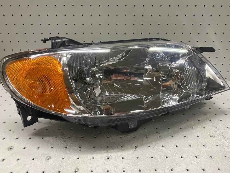 2001 - 2003 年马自达 Protege 替换车头灯总成乘客权利 — 第 4/4 张图片