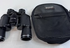 Binoculares Tasco 7x35mm con enfoque de cremallera 2000 negros con estuche