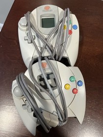 Sega Dreamcast Console with 2 Controllers & Cables with one vmu + one game. 