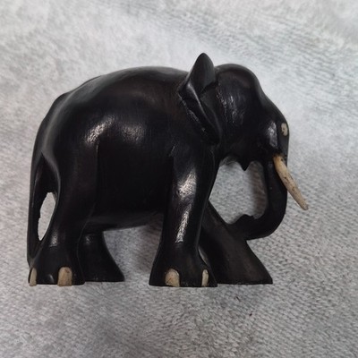 Handmade Carved Wooden Black Elephant Figurine with White Tusks and Eyes