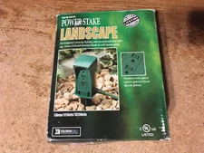COLEMAN CABLE LANDSCAPE POWER STAKE 3 OUTLETS GREEN W/SAFETY COVERS/ WRONGWAY052