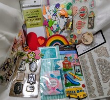 Assorted scrapbook stickers and embelishments