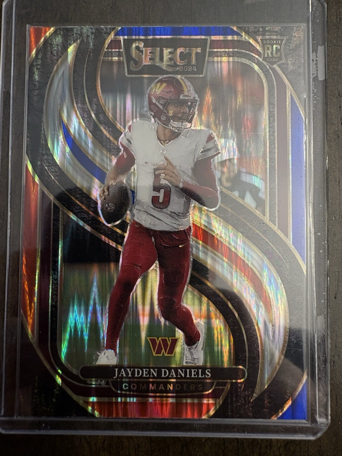 2024 Panini Select Jayden Daniels Premier Red and Blue Prizm Shock #112 RC