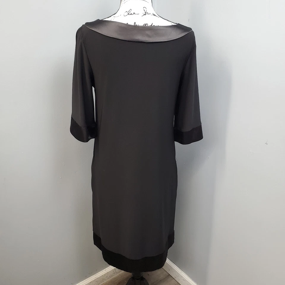 Vestido recto de sangría para mujer 10 negro satinado manga 3/4 cuello barco bolsillos laterales Foto 2 de 4