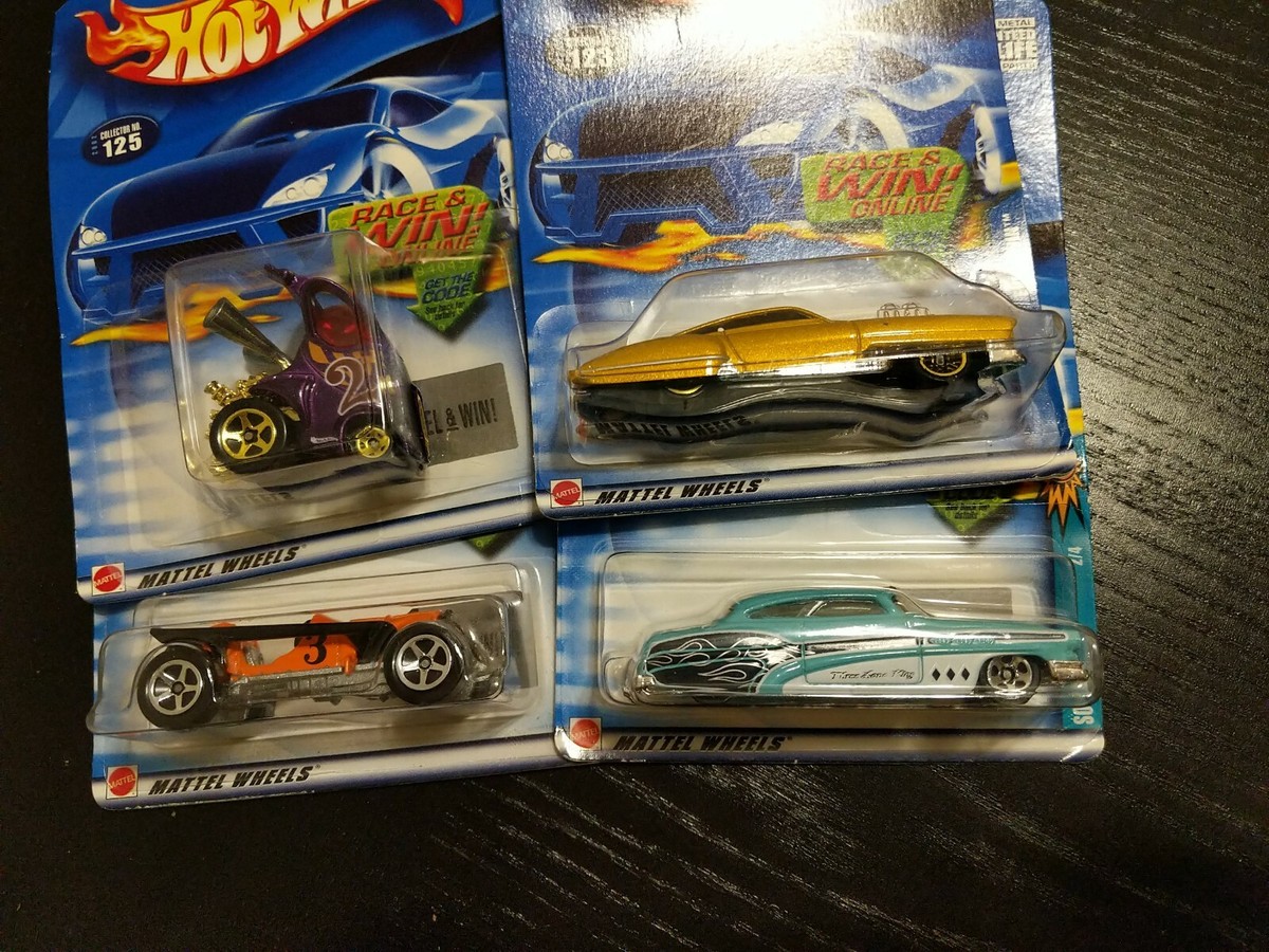 2002 Hot Wheels 4 Diecast Cars unopened, mint condition collectors