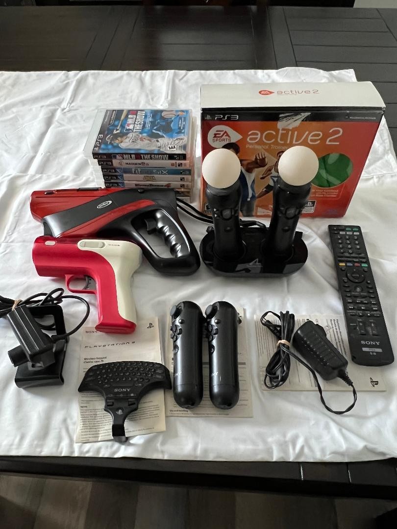 Playstation 3 Move Bundle with 8 CIB games and accessories