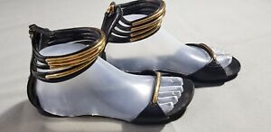 black and gold flat sandals