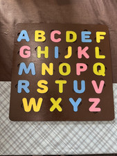 Wooden Alphabet Letters Puzzle 11 inch by 11 inch. brown 