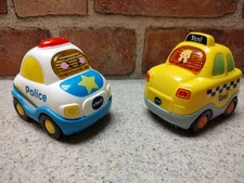 vtech go go smart wheels Police Car And Taxi Cab Works