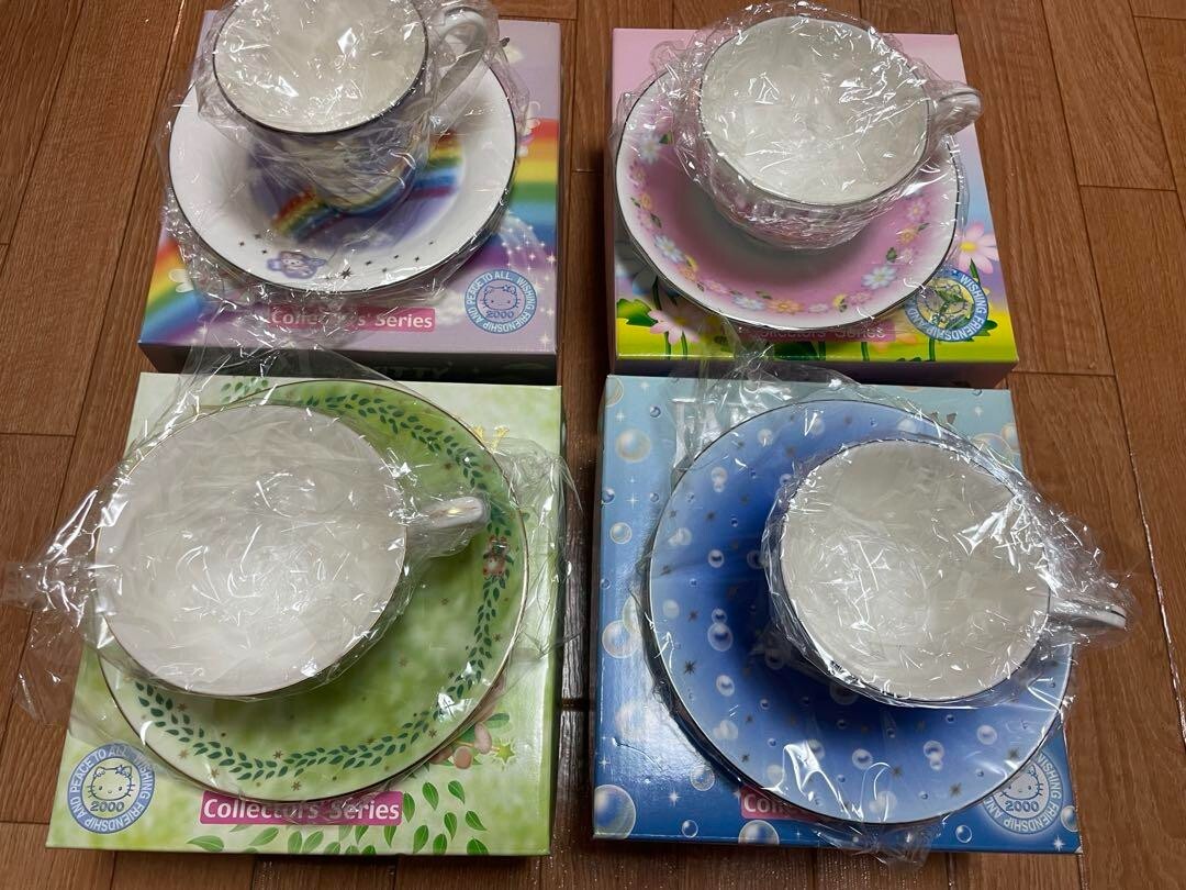 Hello Kitty Fairy Collection Cup & Saucer set of 4 very rare Hello Kitty Fairy Collection Cup & Saucer set of 4 very rare