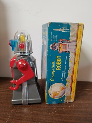 1960's CRAGSTAN JAPAN TIN BATTERY OP SILVER SKIRTED ROBOT 1960's CRAGSTAN JAPAN TIN BATTERY OP SILVER SKIRTED ROBOT