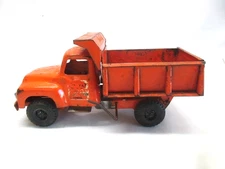 Vintage Buddy L Contruction Company orange dump bed truck