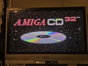 Commodore Amiga CD32 Gaming Console + TVI Modem Remote, Controller  WORKS!