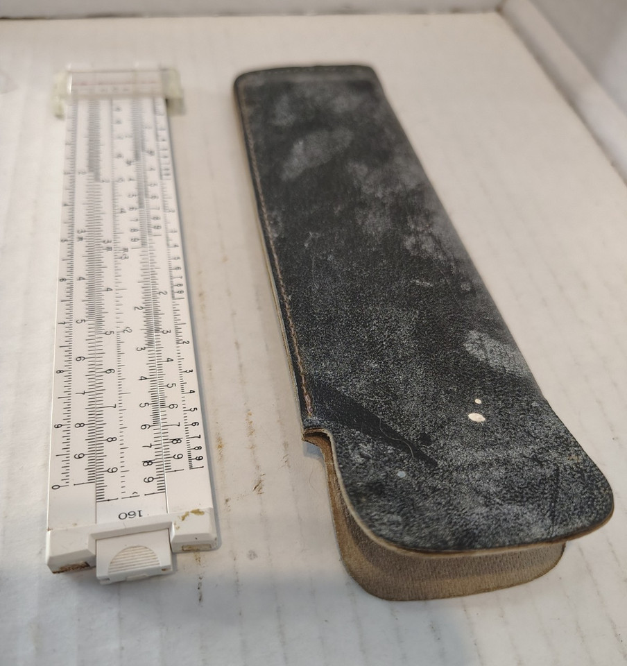 A compact 6-inch pocket slide rule made in the USA — the kind of analog gadget that fits in a shirt pocket and makes you look like the coolest engineer at any party.