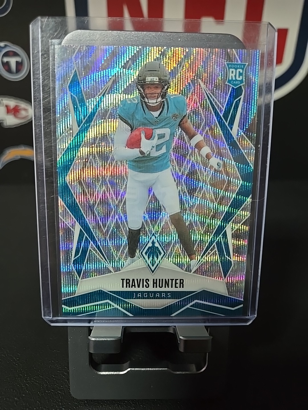 2025 Panini Phoenix - Rookies Travis Hunter #157 Wave /199 (RC)