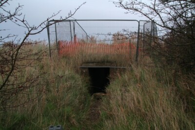Foto 6x4 Eingangstunnel zum Aussichtsposten, unter der Meereswand bei Do c2015