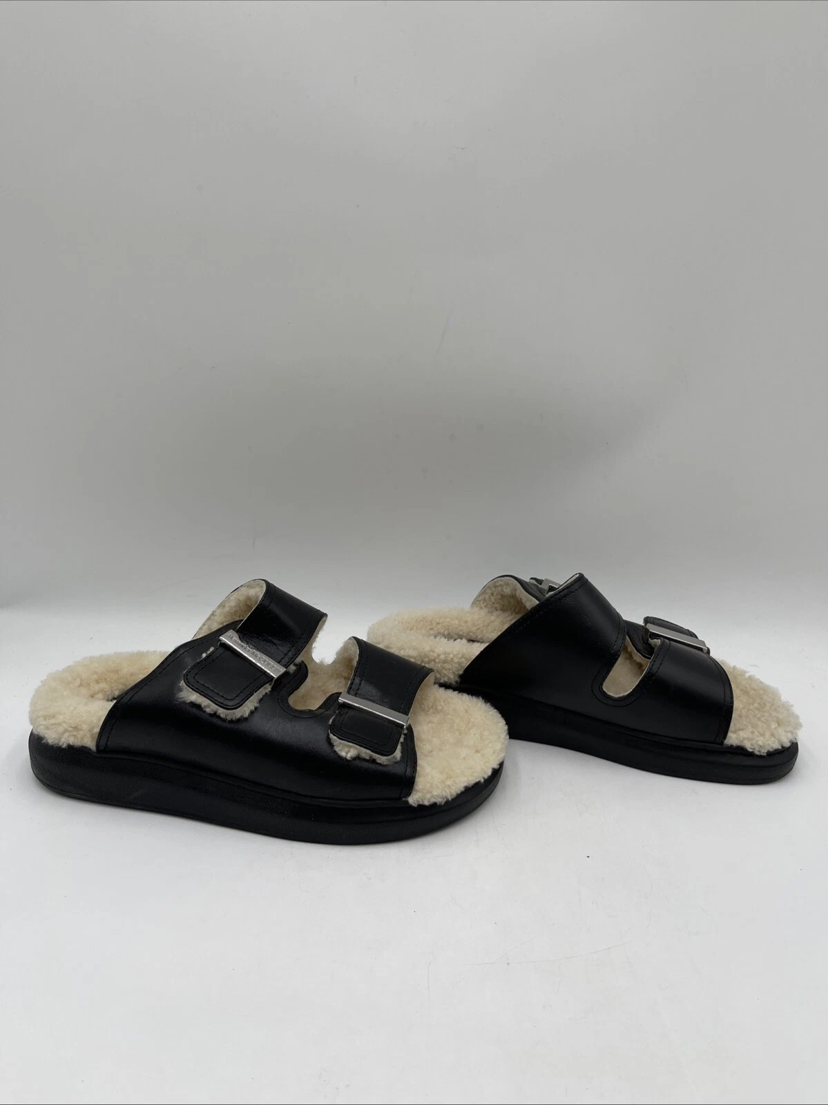 Sandali Alexander McQueen doppia fibbia pelle nera shearling slide Wmns 37