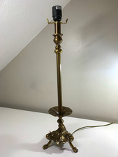 19th century brass table lamp. Elegant fluted column and ornate Caw feet base