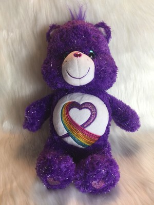 purple care bear with rainbow heart