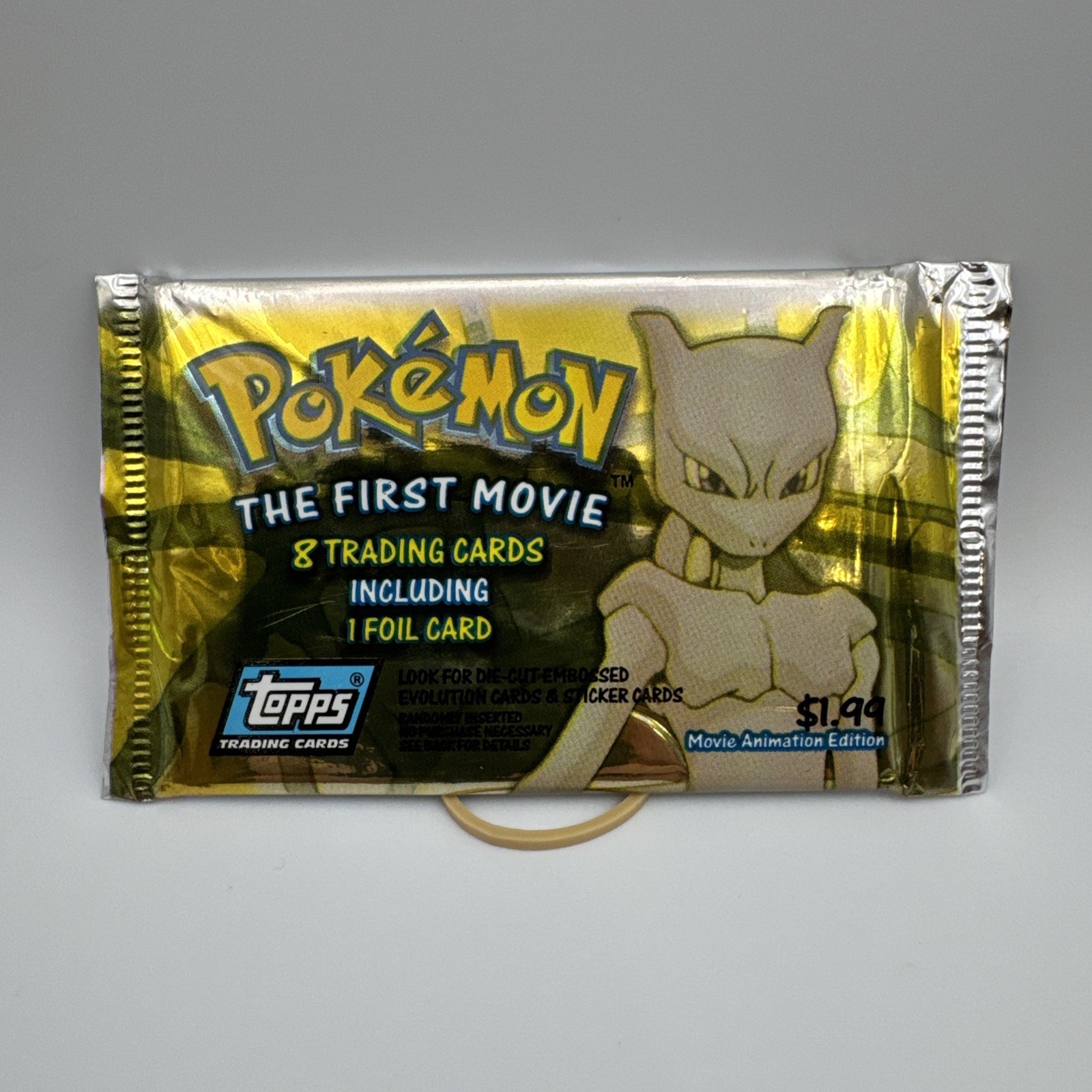 1999 Topps Pokémon The First Movie Sealed Booster Pack – 8 Cards 1 Foil