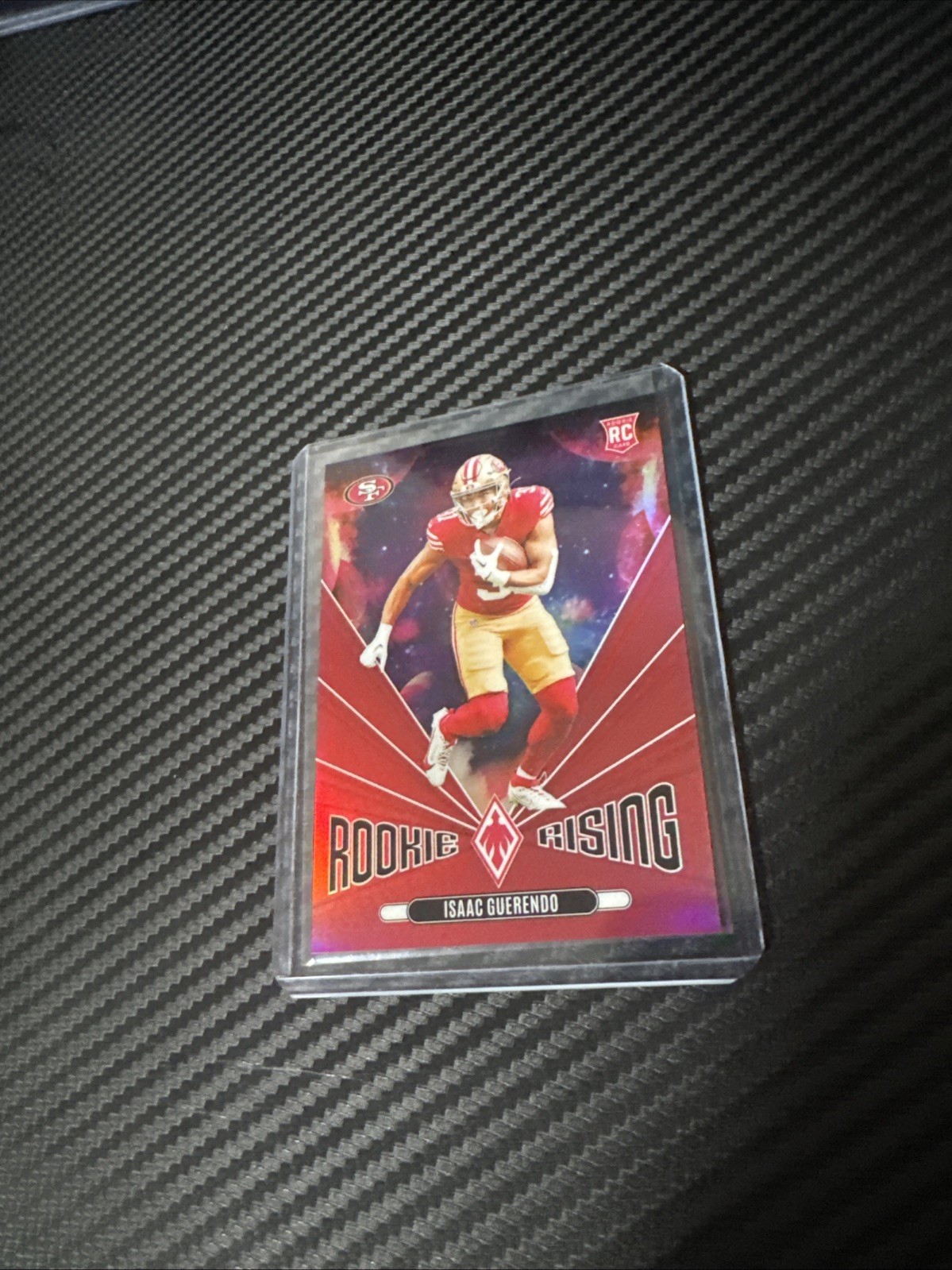 2024 Panini Phoenix Rookie Rising Isaac Guerendo #RR-IGO Red /99 Color Match