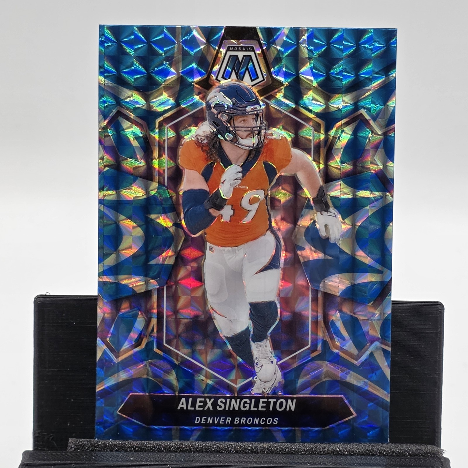 2024 Panini Mosaic #69 Alex Singleton Mosaic Reactive Blue