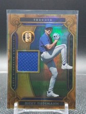 2023 Panini Chronicles Ricky Tiedemann Gold Standard Swatch Blue Jays