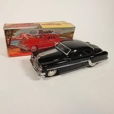 Minister Delux No. A-34951/81   Black Friction Tin Toy Car   1950s