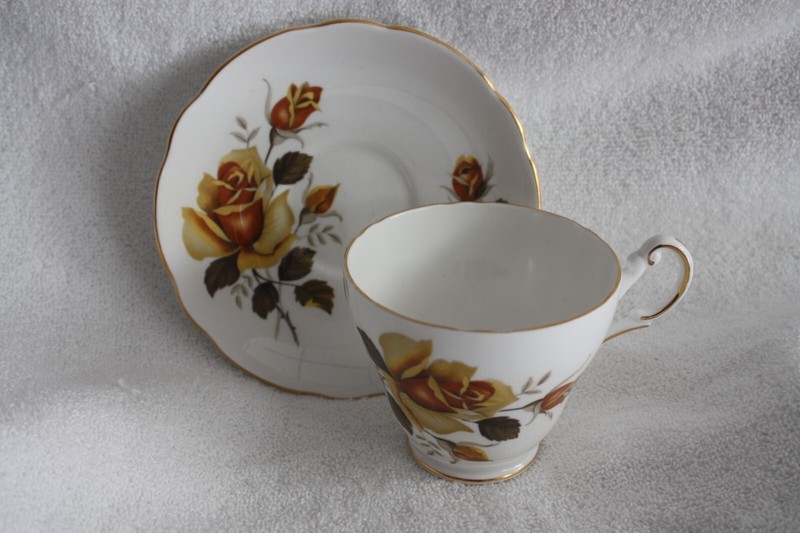 Vintage Regency Yellow Rose Pattern Footed Teacup and Saucer