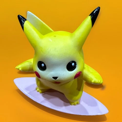 Vintage Surfing Pikachu Action figure from the Pokémon Monster Collection Toy