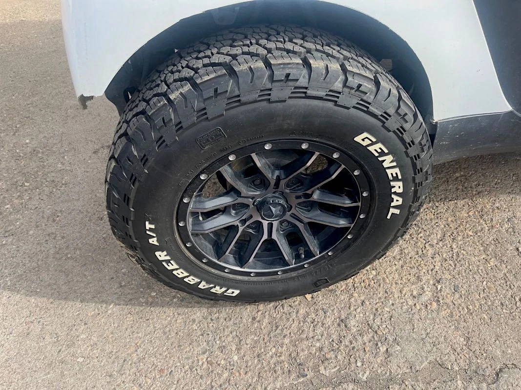 Lifted Smart Fortwo on General Grabber A/Ts - front wheel well detail