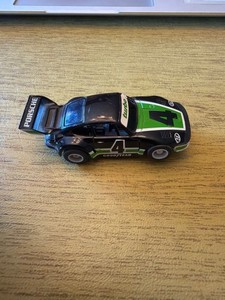 Tyco Porsche TURBO Black Green White #4 Slot Car with Headlights