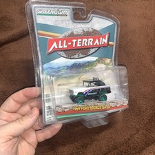 Chase 1969 FORD BRONCO BAJA BLACK & WHITE BFGOODRICH 1/64 GREENLIGHT